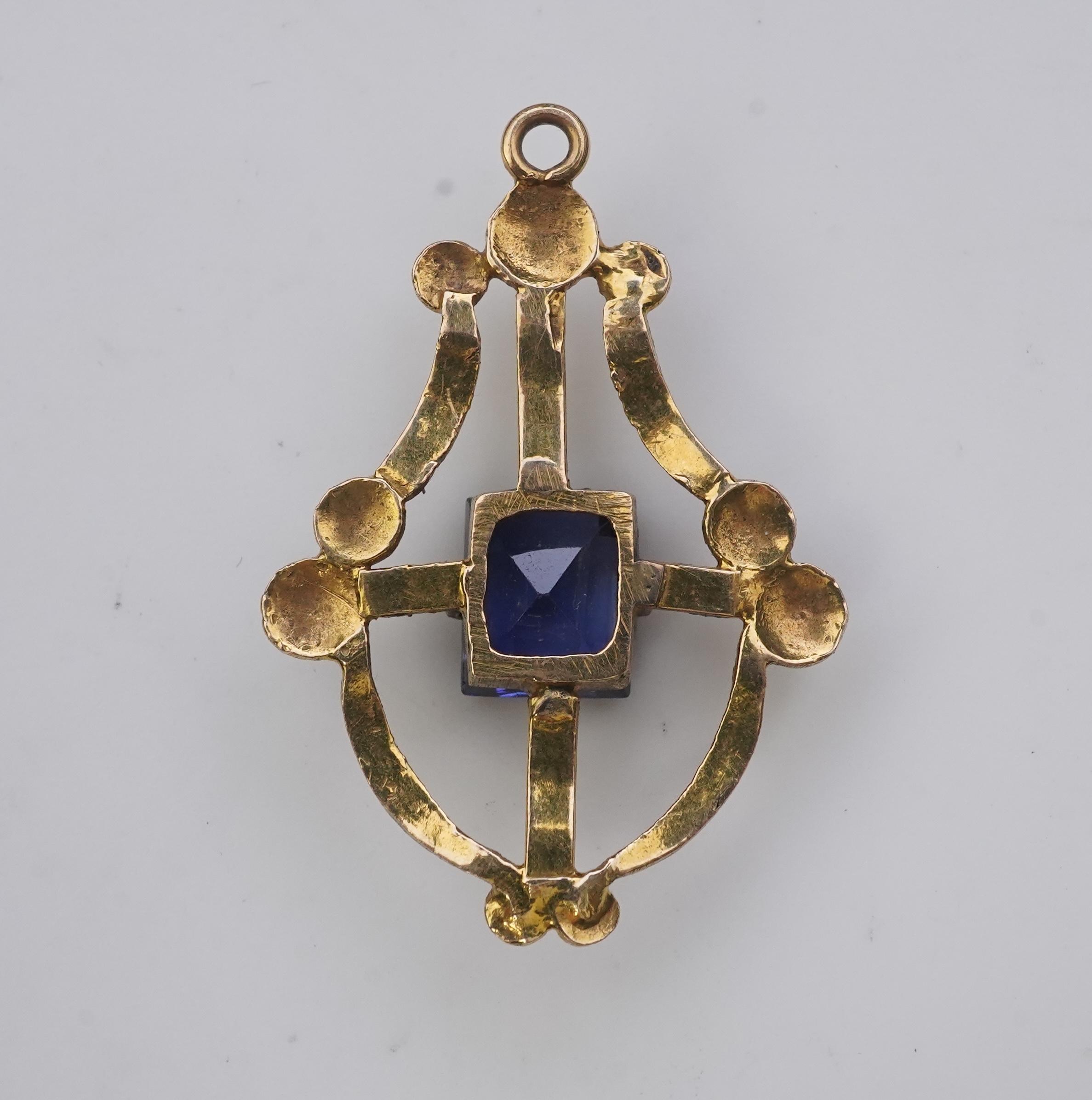 A collection of three brooches and a pendant, 19th and 20th century